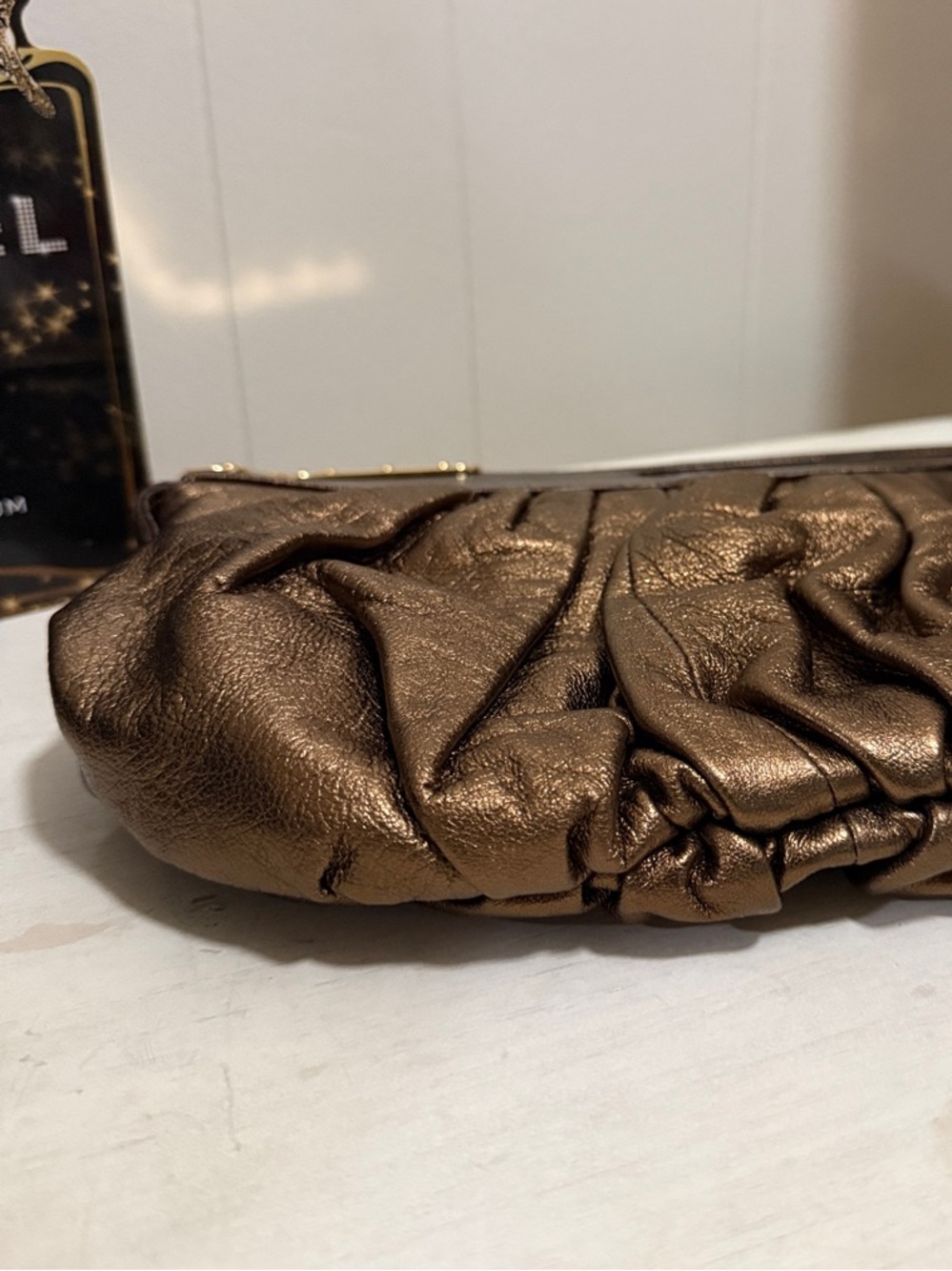 BCBGMAX Azria Bronze Metallic Pleated Wristlet Clutch with Gold Accents - Picture 4 of 11
